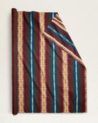 Pendleton Tye River southwestern wool fabric with bold blue, burgundy, ivory, and brown striped geometric pattern, blanket-weight jacquard upholstery fabric