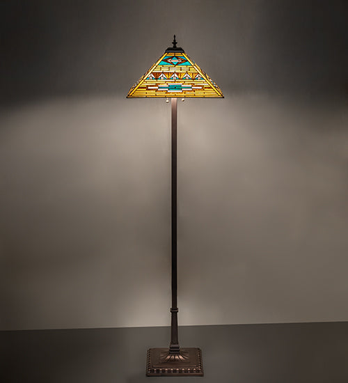 Valencia Mission floor lamp illuminated with warm stained glass glow and geometric design
