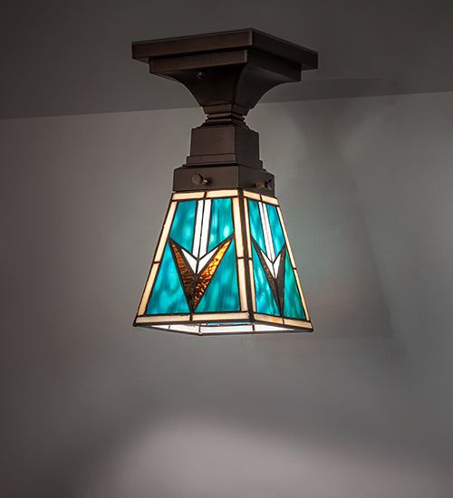 Valencia Turquoise Mission Flush Mount installed on ceiling with warm illuminated glow