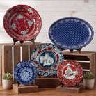 Western Americana melamine dinnerware set with horses, cowboy artwork, and red and blue bandana patterns