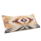 Decorative pillow with geometric pattern on a white background