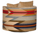 Rear view of the Wyeth Trails Swivel Chair featuring authentic Pendleton® Wyeth Trails fabric wrapped around the curved barrel back.