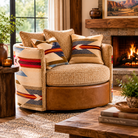 Wyeth Trails Swivel Chair featuring authentic Pendleton® geometric fabric, textured chenille upholstery, and a leather swivel base styled in a warm Western living room.