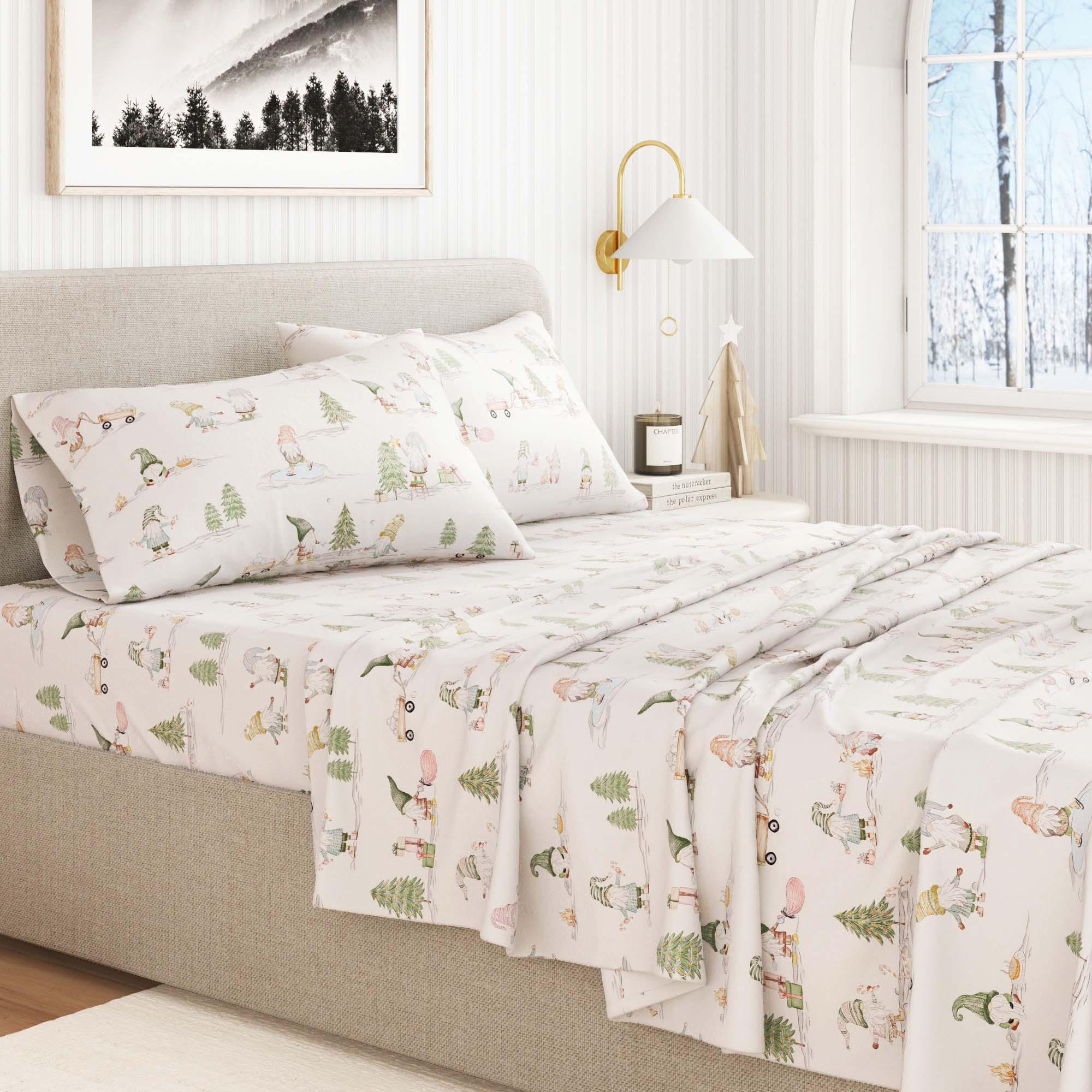 Bed with Gnome patterned holiday bedding in a bedroom setting