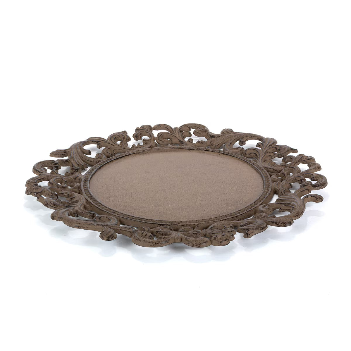 An ornate oval cast iron charger plate with a detailed scrollwork border and a smooth, matte brown center, shown on a plain white background.