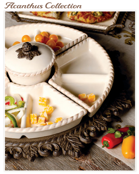 An off-white ceramic divided serving platter with a small lidded bowl, shown styled with food on a rustic wooden surface. The platter has a rope-like rim and is photographed in a warm, indoor setting with decorative vegetables and a dark carved tray underneath.