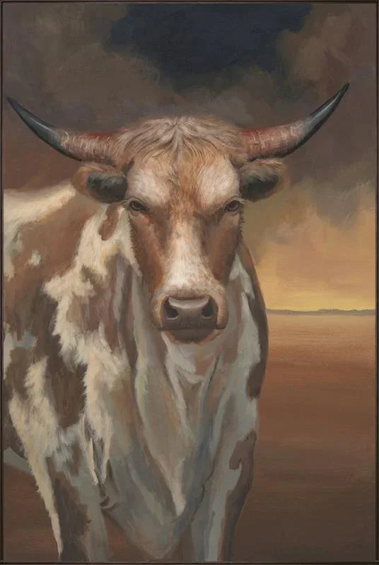 Framed art of a longhorn cow with a dramatic sky in the background - Your Western Decor