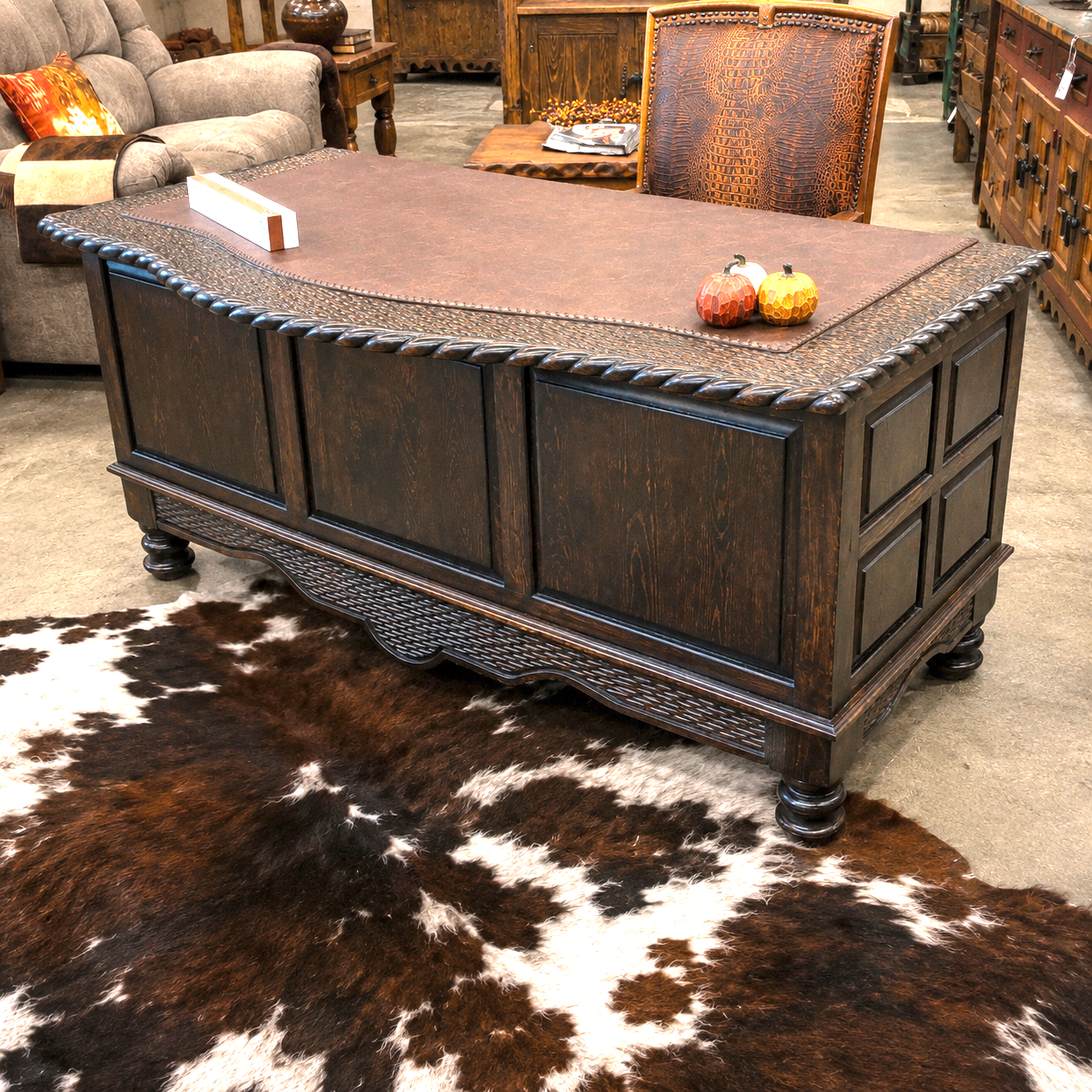 Alder western executive desk with rope carved edges, leather writing surface and nail trim 