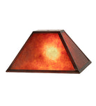 Rectangle amber mica lamp shade with iron frame. Light is on
