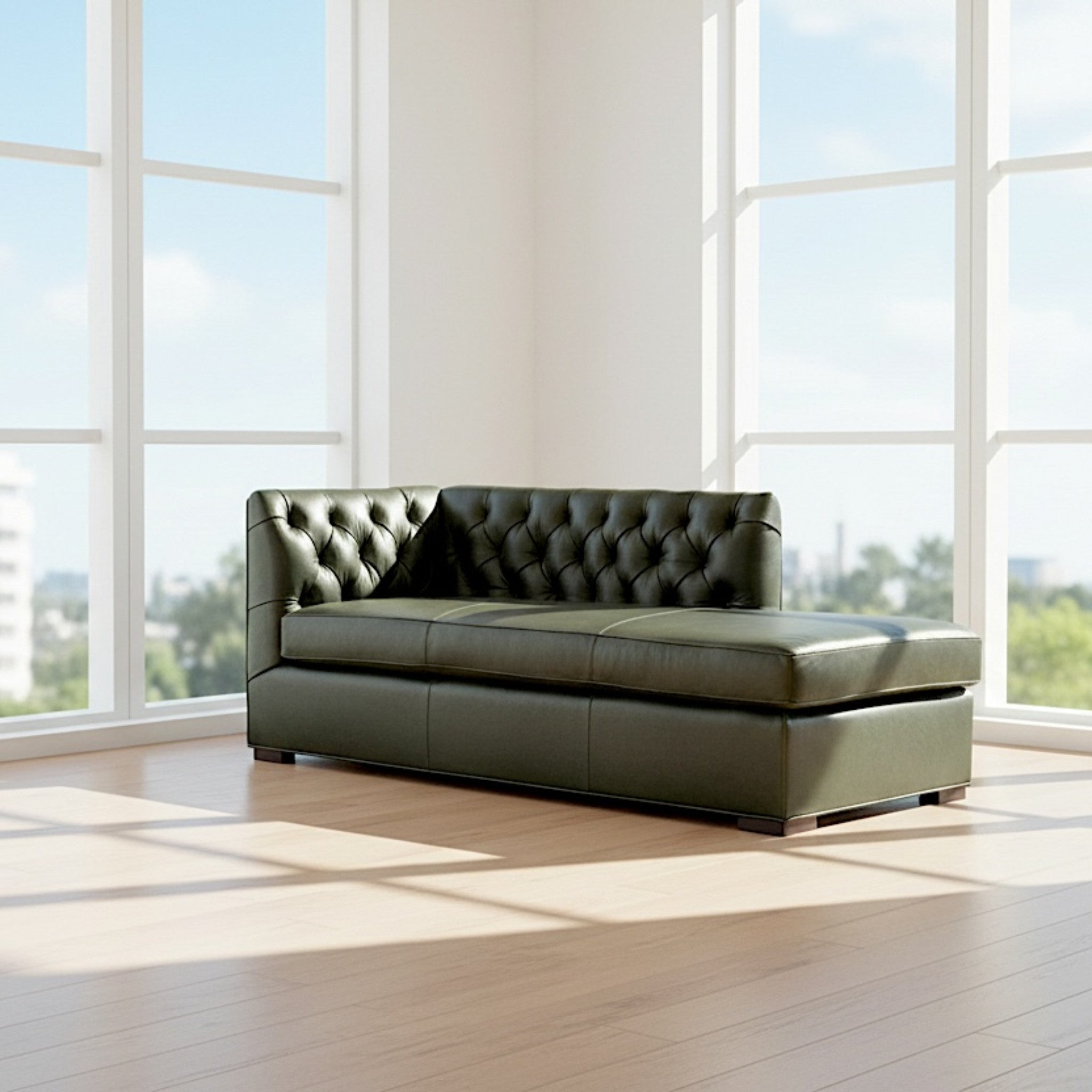 Green tufted leather daybed in open high-rise loft
