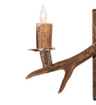 Antler wall sconce light detail 