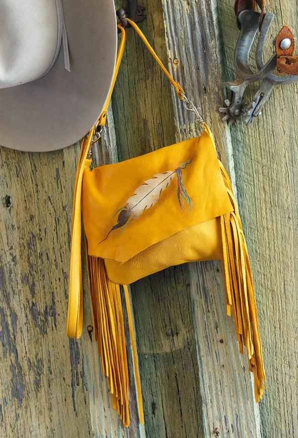 Gold Arapaho Painted Feather deerskin leather handbag with hand-painted feather motif, long fringe and crossbody strap