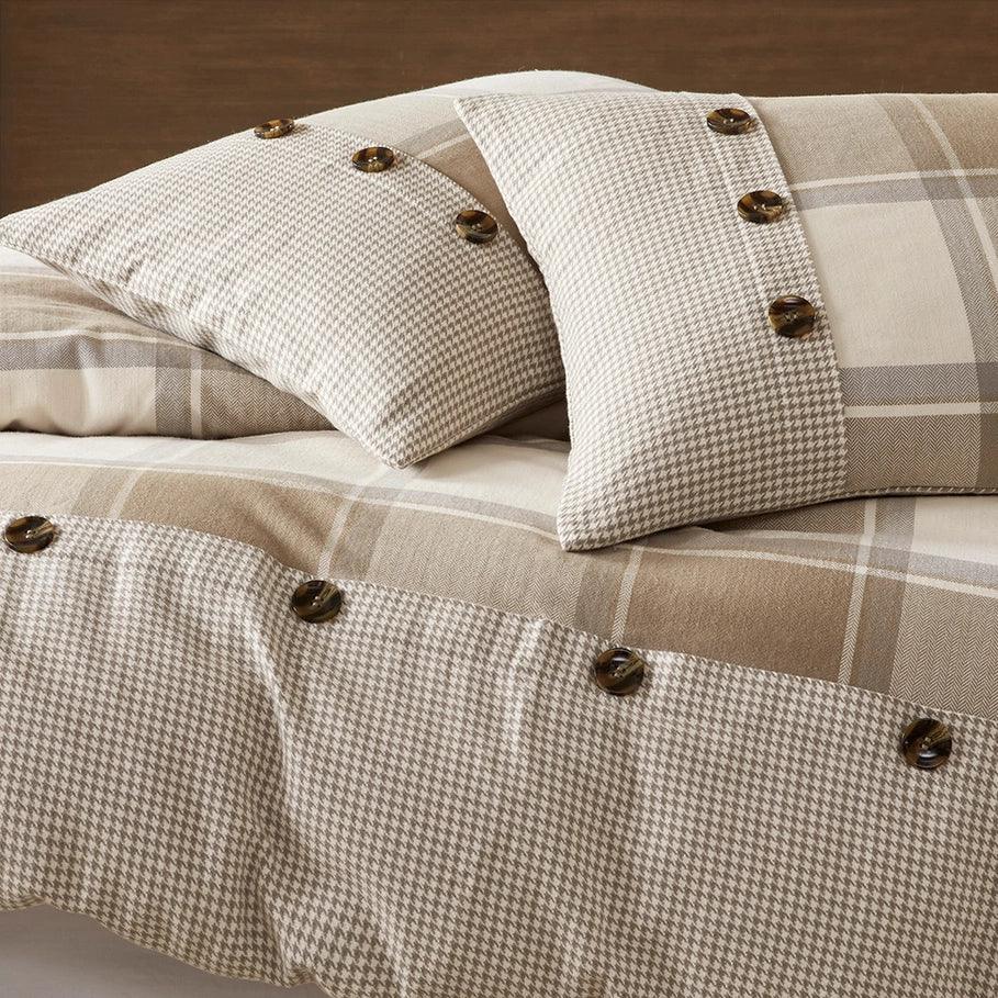 Aria Plaid patterned bedding with button details on a bed - Your Western Decor