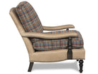 Luxury lodge reading chair with leather arms and plaid upholstery