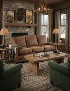 Cozy living room with brown sofa, wooden coffee table, and stone fireplace - YOur Western Decor