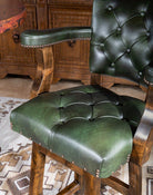 Tufted green leather bar stool with arms, made in the USA - Your Western Decor