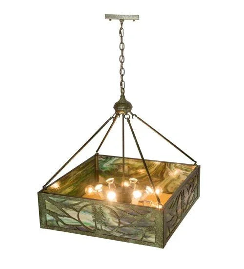western lodge pendant light with antique copper finish and nature inspired stained glass design