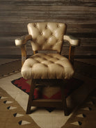 Beige tufted leather swivel bar stool with embossed leather arms and back - Your Western Decor