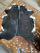 Black Brazilian cowhide with white - Your Western Decor