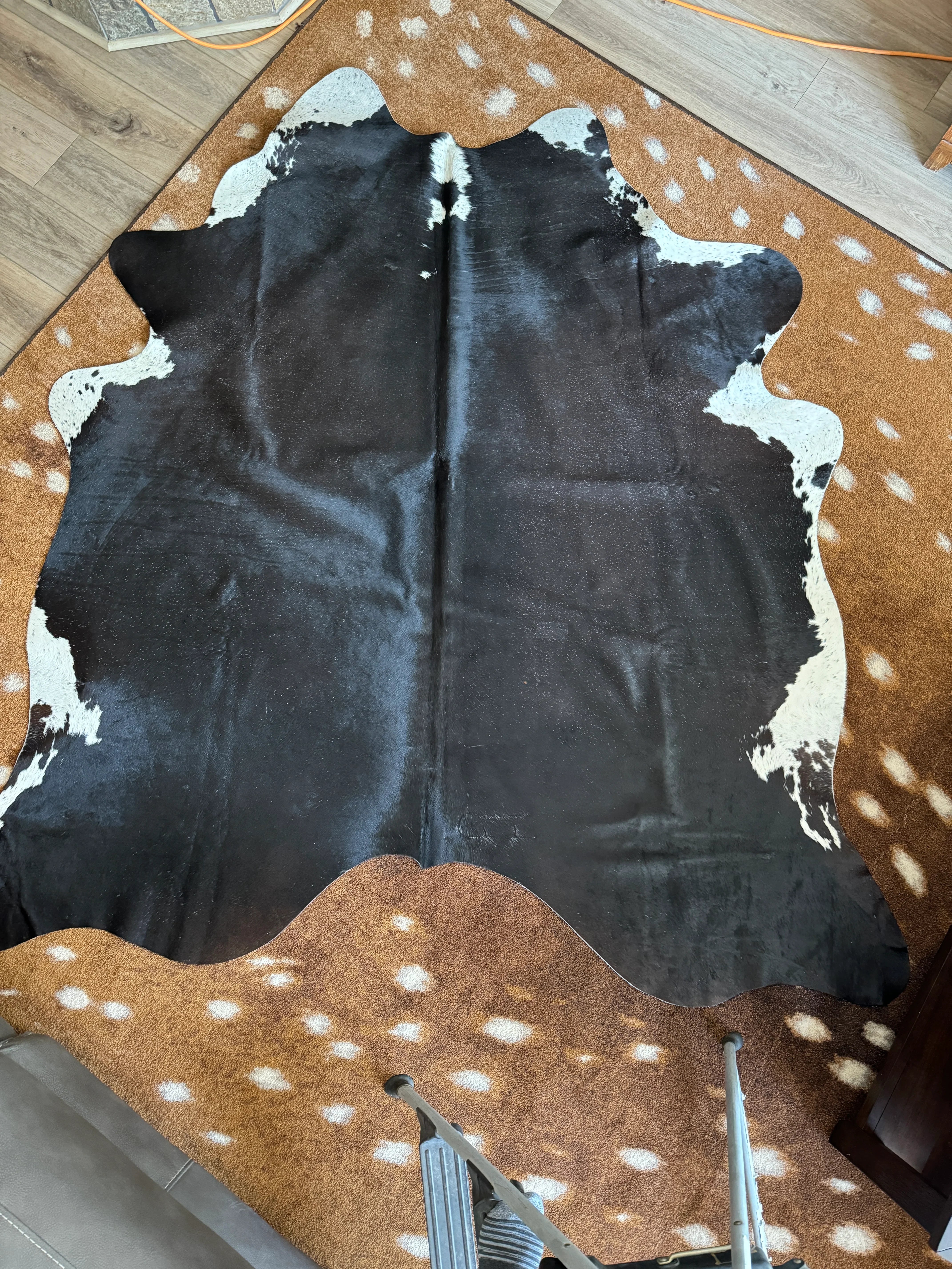 Black Brazilian cowhide with white - Your Western Decor