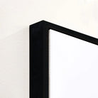 Close-up of a black picture frame corner on a white background - Your Western Decor