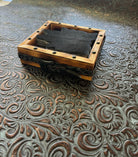 Set of black cowhide coasters in western handmade display box