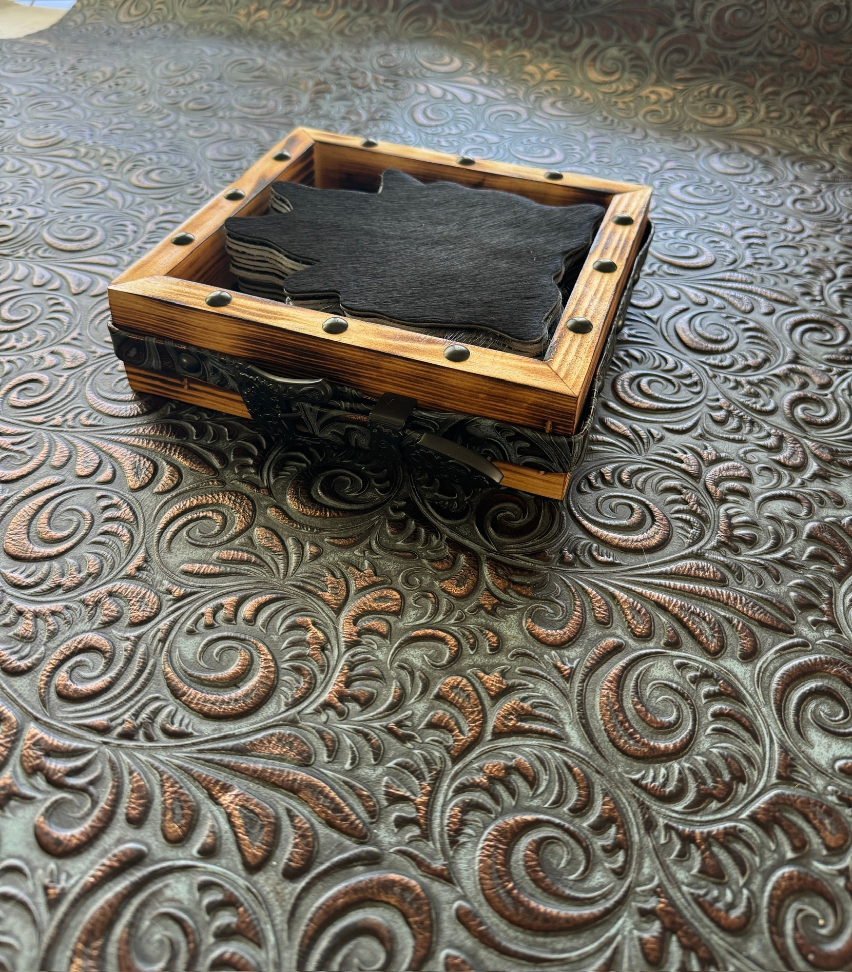 Set of black cowhide coasters in western handmade display box