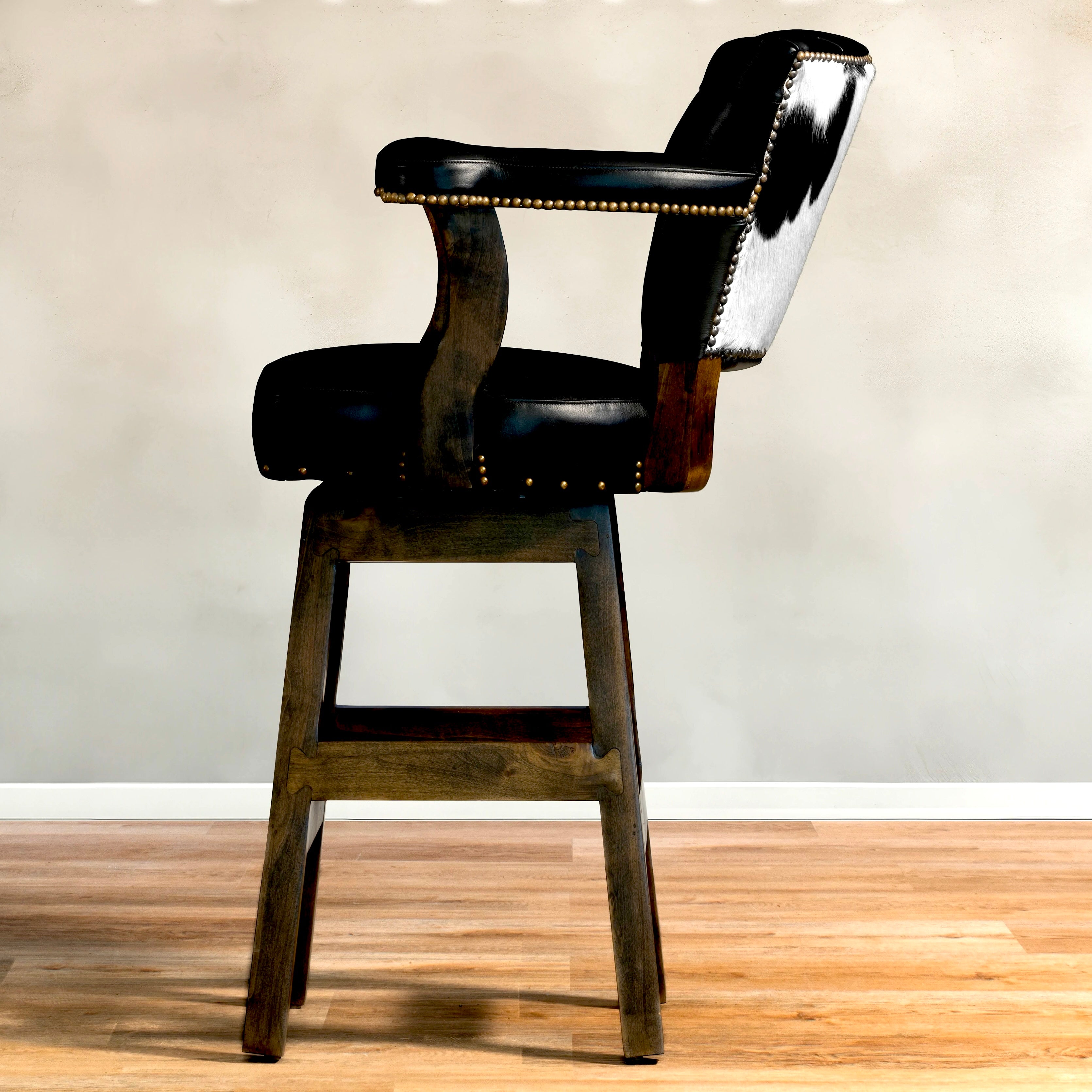 Black and white cowhide, black tufted leather swivel bar and counter stools made in the USA - Your Western Decor