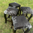 rustic ranch bar stools with nail trim and peppered cowhide seats