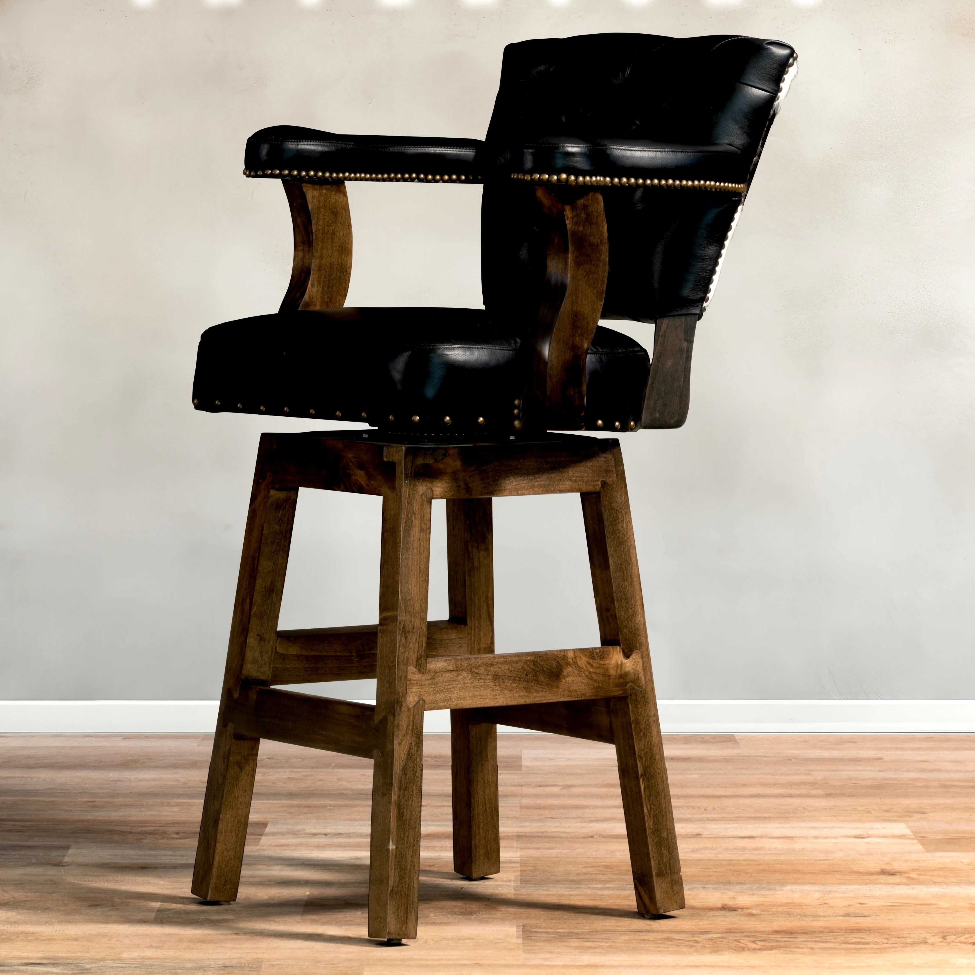 Black and white cowhide, black tufted leather swivel bar and counter stools made in the USA - Your Western Decor