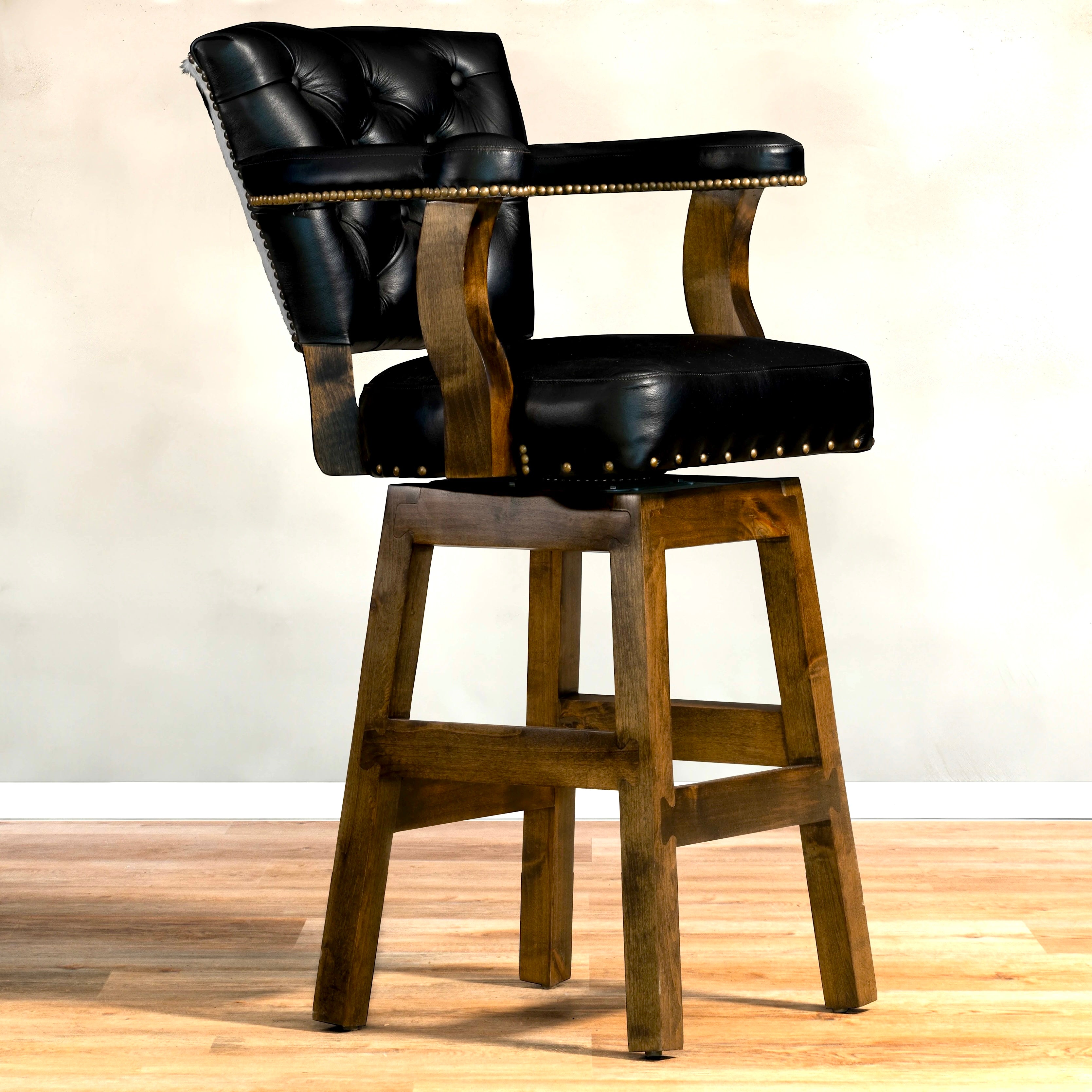 Black and white cowhide, black tufted leather swivel bar and counter stools made in the USA - Your Western Decor