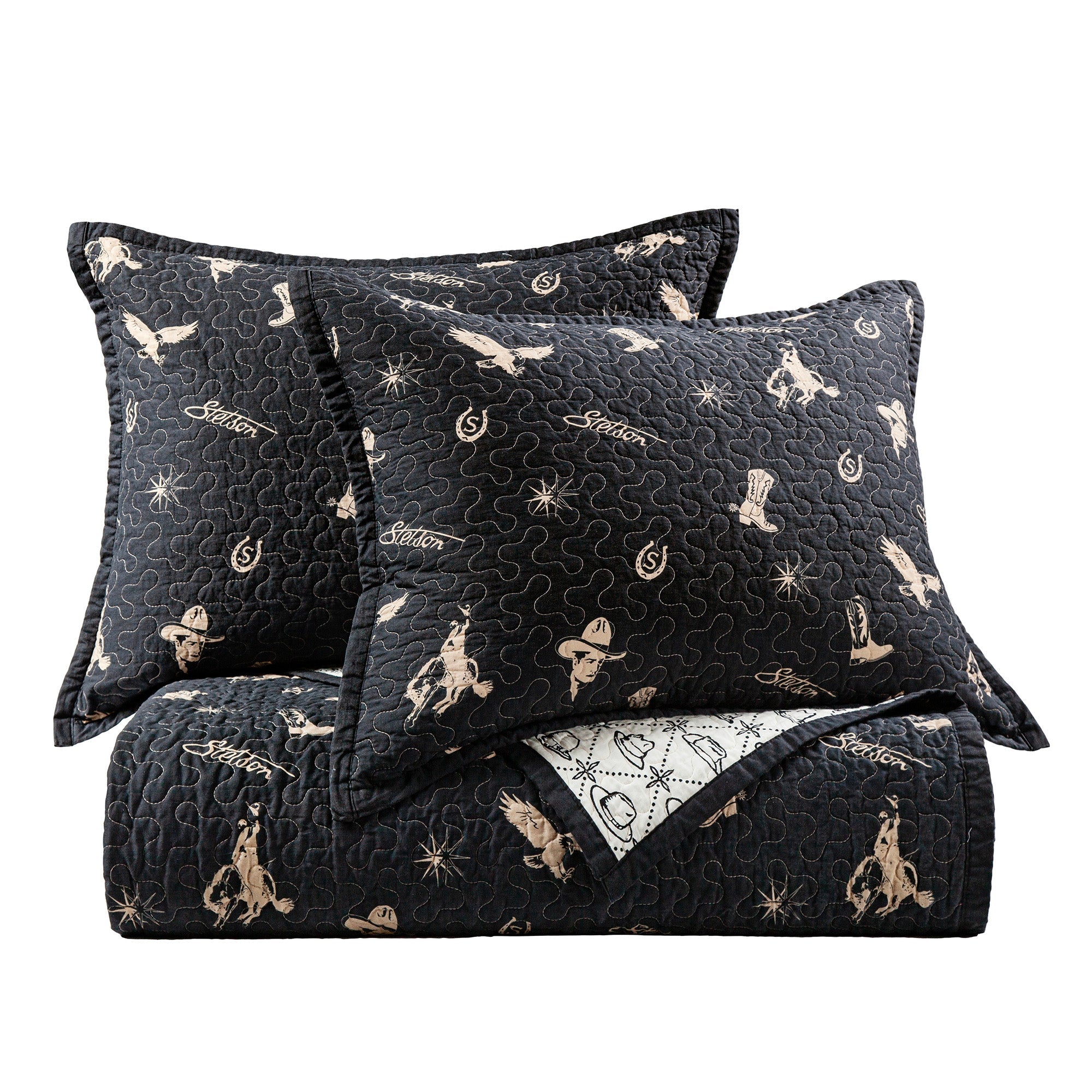 Black quilt set with cowboy pattern on a white background