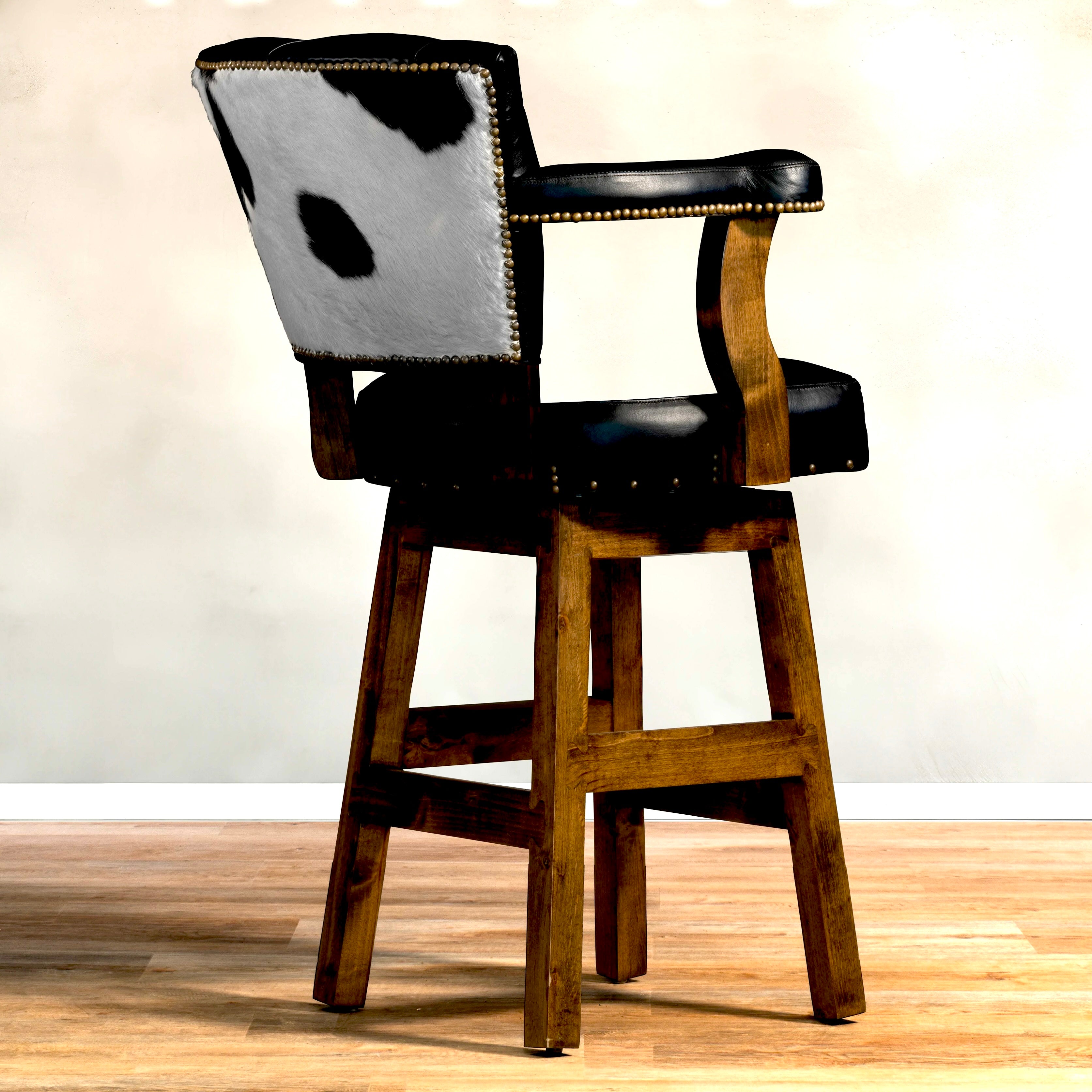 Black and white cowhide, black tufted leather swivel bar and counter stools made in the USA - Your Western Decor