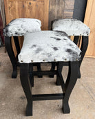 Custom black and white peppered cowhide bar stools - Your Western Decor