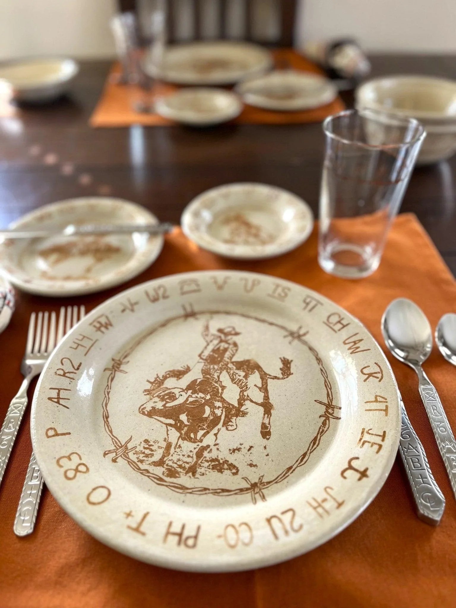 Western dinnerware, flatware, and glassware with ranch brands