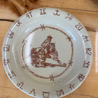 Blue Mountain Brands western salad plate handmade in Pendleton, Oregon in a warm ivory with Pendleton Round Up barrel racer, barbed wire and Umatilla County authentic ranch brands