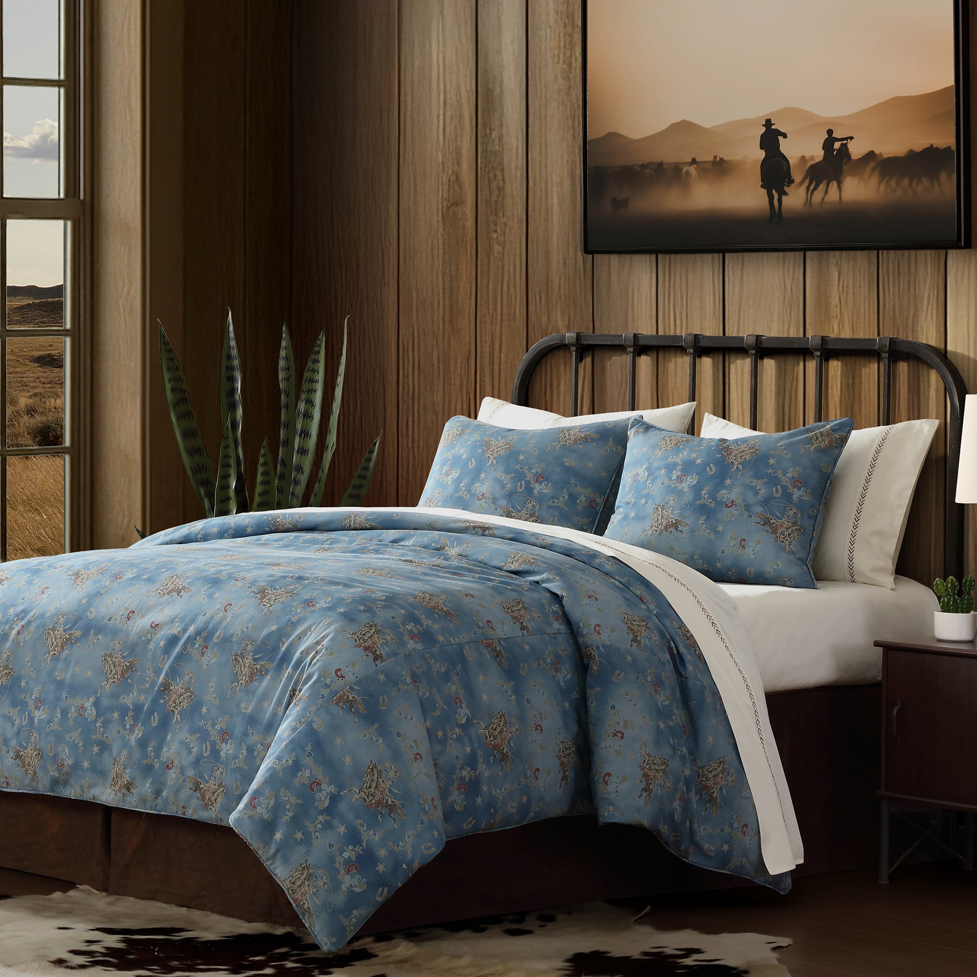bed with blue rodeo bedding set