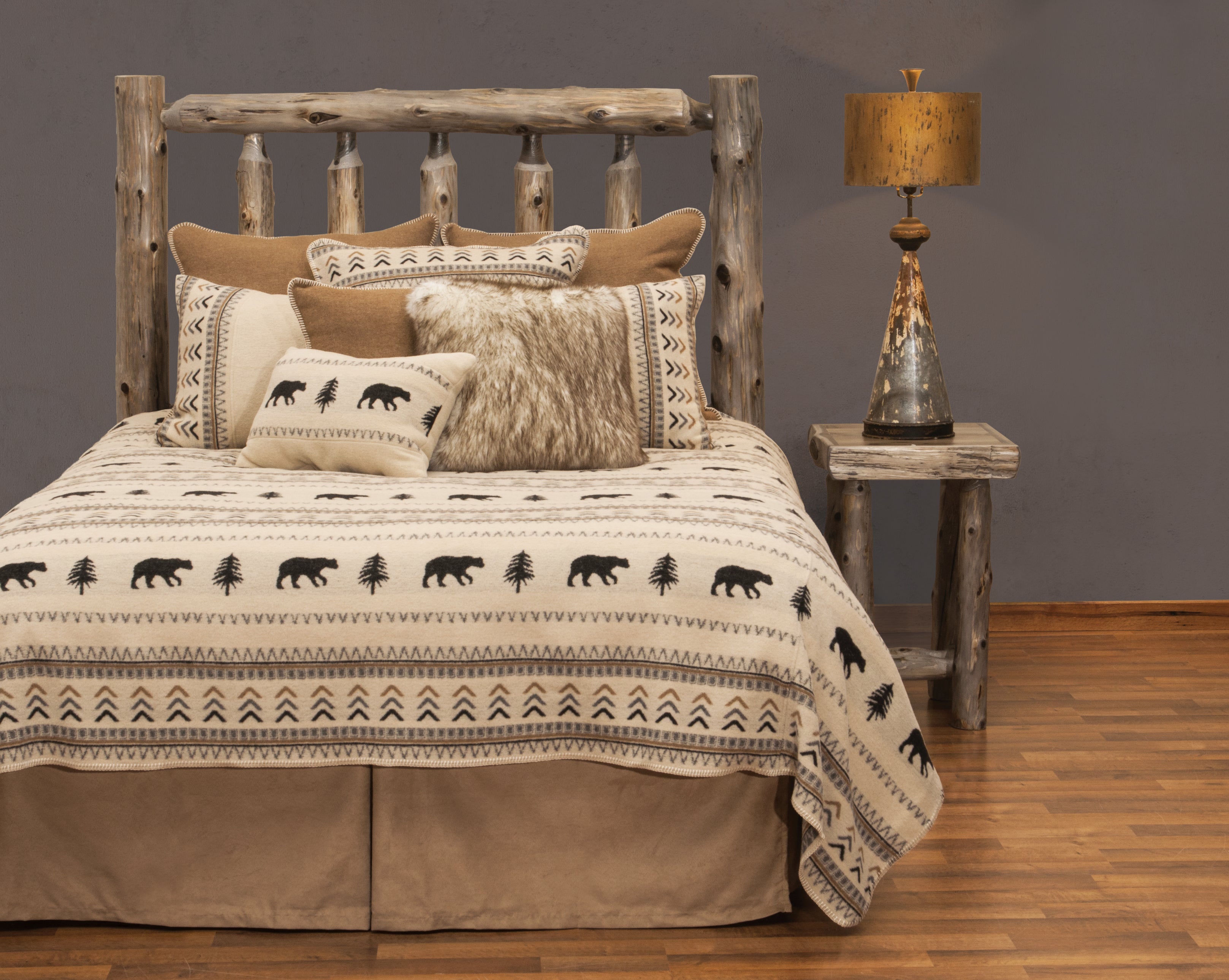 Boulder creek cabin bedding with bears, trees, and design over light cream background 