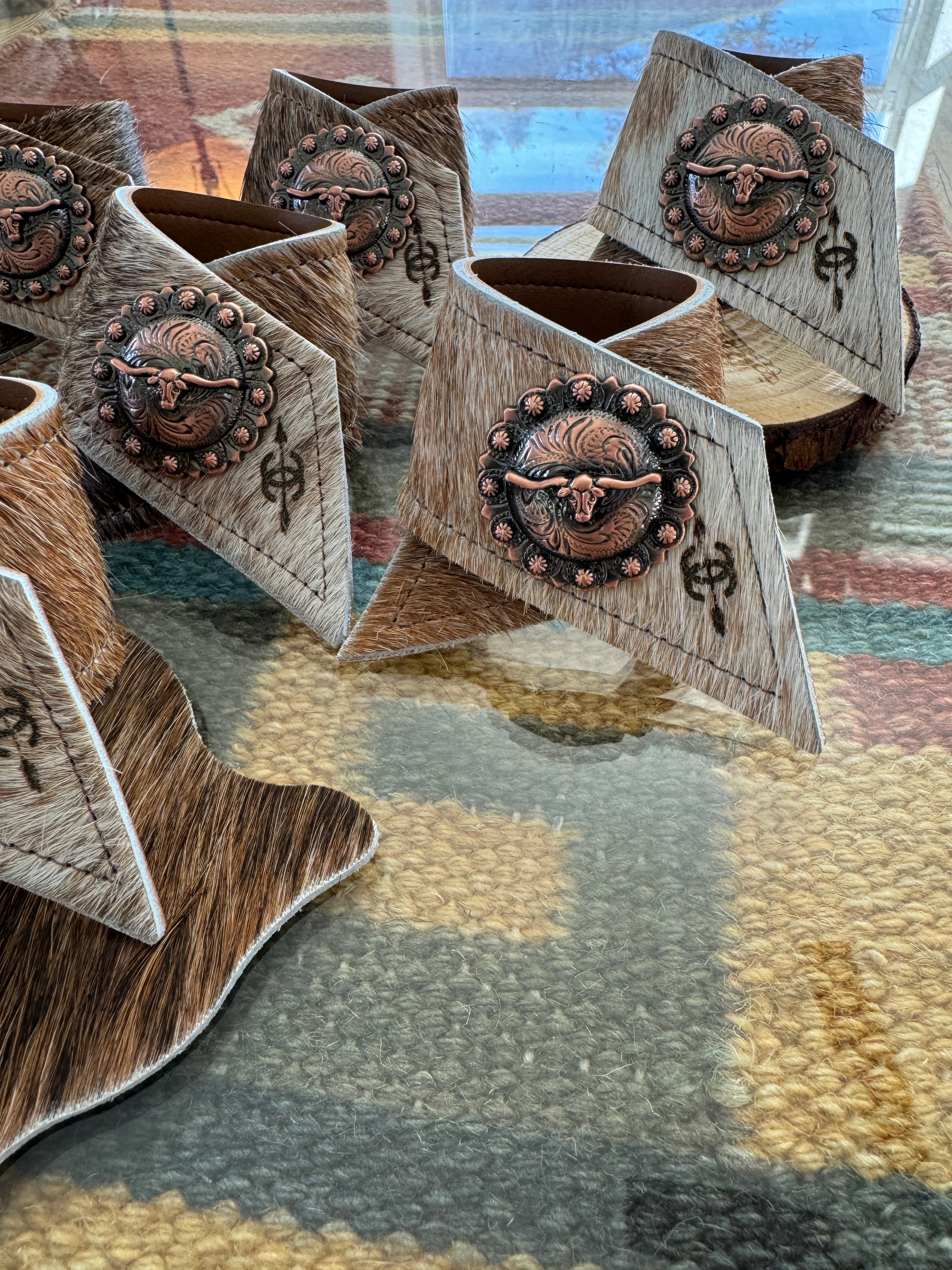 Custom laser branded cowhide napkin rings and coasters - Handmade by Your Western Decor