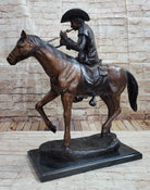 Breath Cowboy Lighting Pipe on Horse, bronze sculpture by Frederic Remington - Your Western Decor