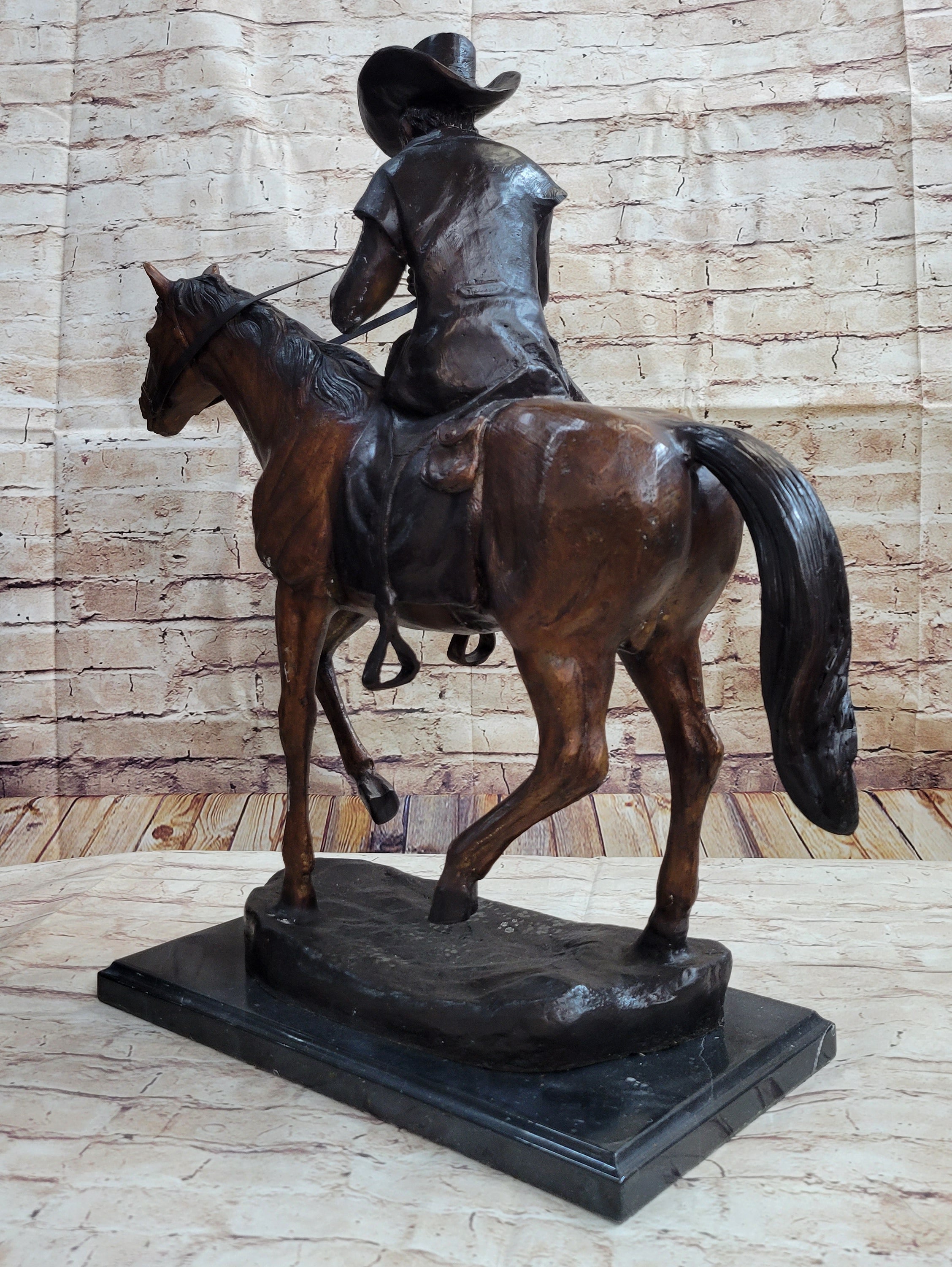 Breath Cowboy Lighting Pipe on Horse, bronze sculpture by Frederic Remington - Your Western Decor