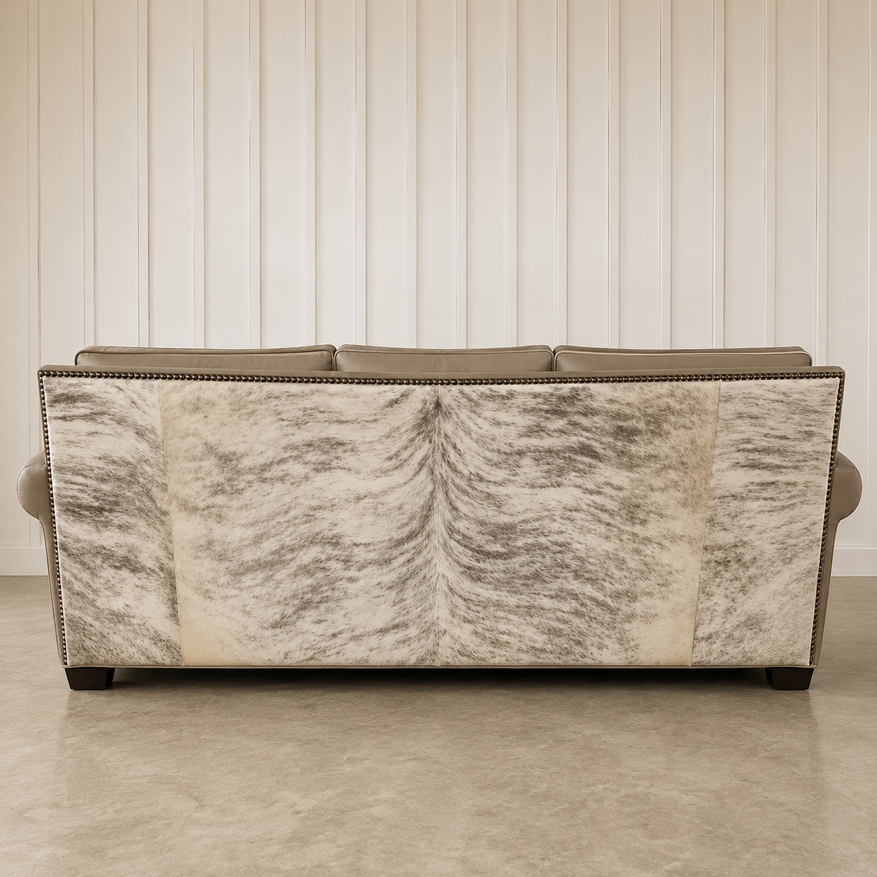 Rear view of the Cashmere Reserve Leather Sofa featuring beautifully matched light grey brindle cowhide.