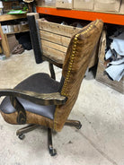 Custom made office chair in dark chocolate leather, brindle cowhide, and nail trim 