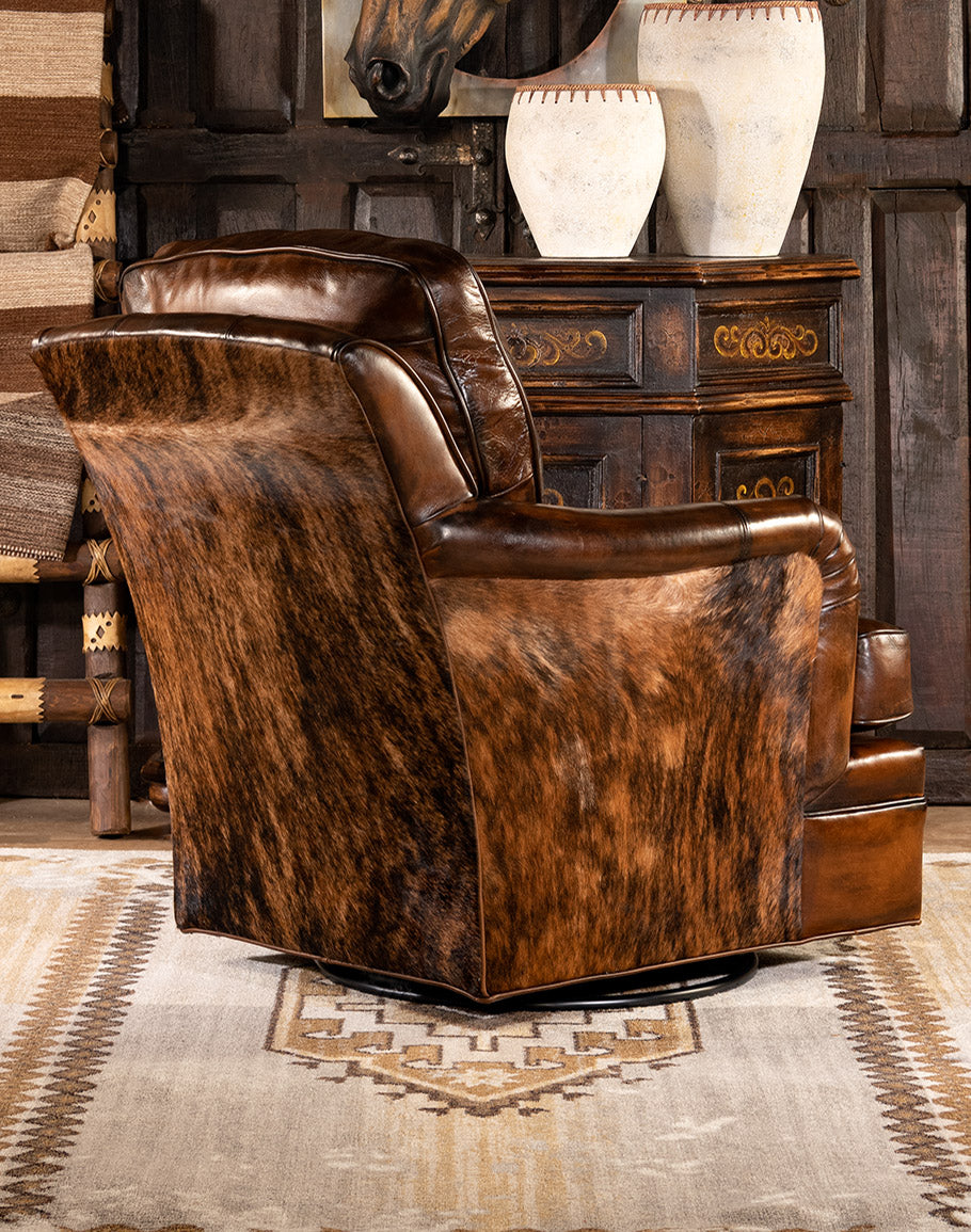 Dark brown burnished leather and brindle cowhide upholstered swivel glider chair made in the USA - Your Western Decor