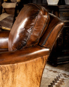 Dark brown burnished leather and brindle cowhide upholstered swivel glider chair made in the USA - Your Western Decor