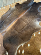 Brown Brazilian cowhide rug with natural tones premium hair on hide western decor