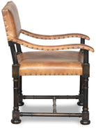 Brown leather accent chair with exposed wood frame and nail trim side view