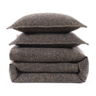 Folded brown tweed bedding set 