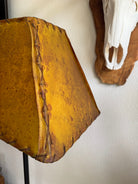 Hand-laced buckskin rawhide rectangle lamp shade showing handcrafted whip stitching and natural veining