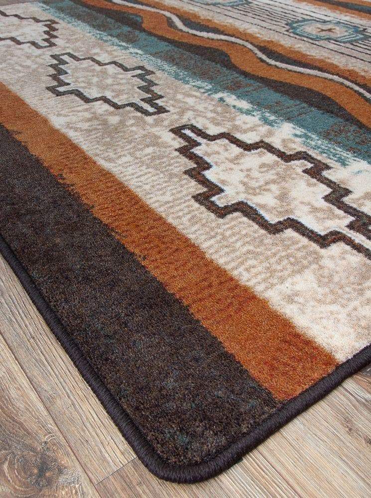 buckskin, black, turquoise, beige southwestern area rug detail
